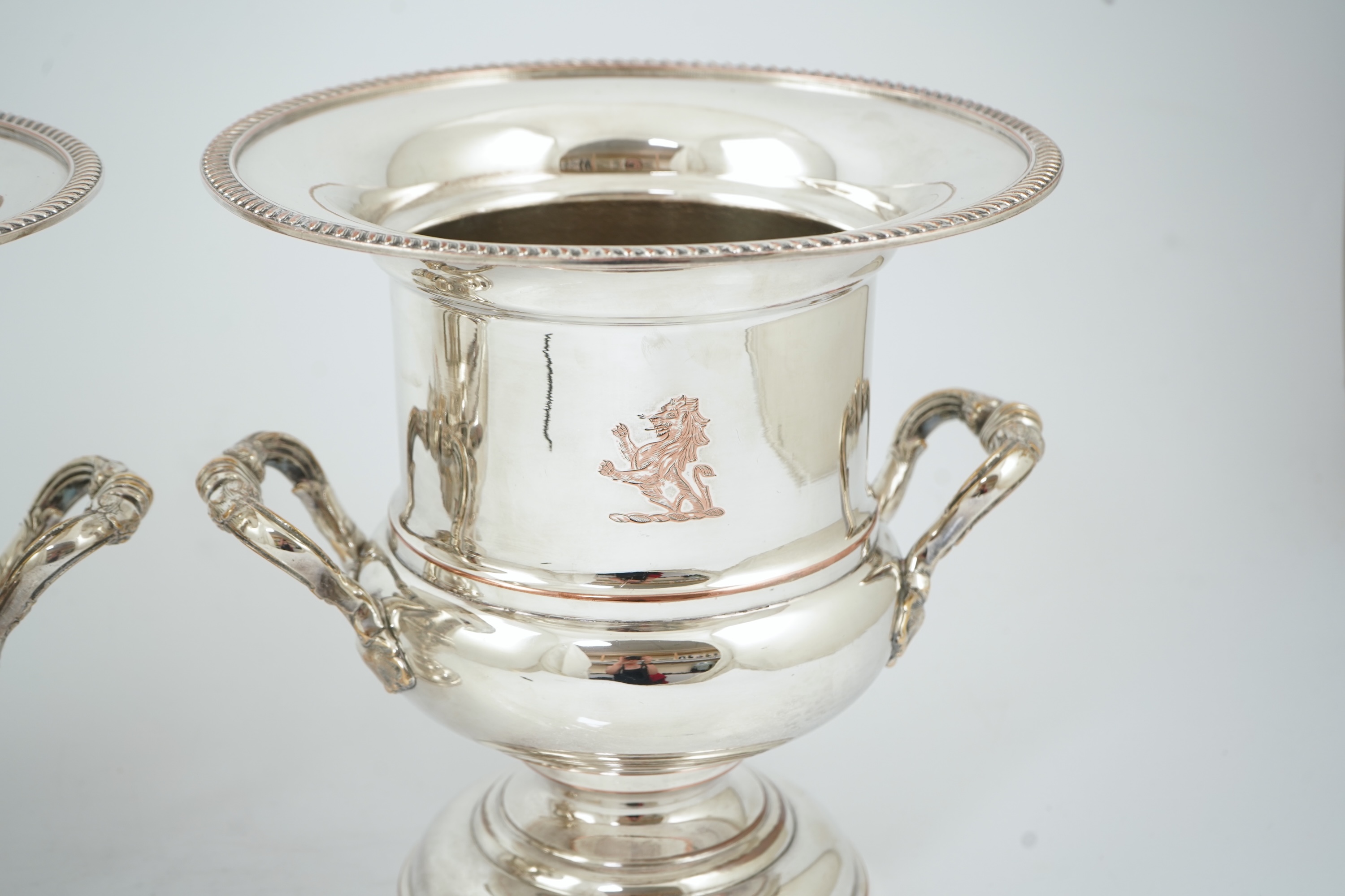 A pair of late 19th/early 20th century silver plated two handled campana shaped wine coolers, makers, FH